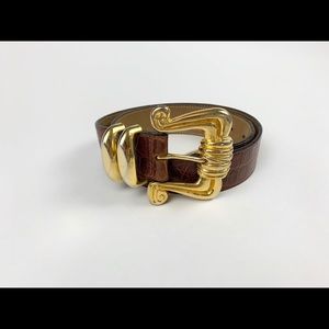 Brown leather skin belt with gold buckle